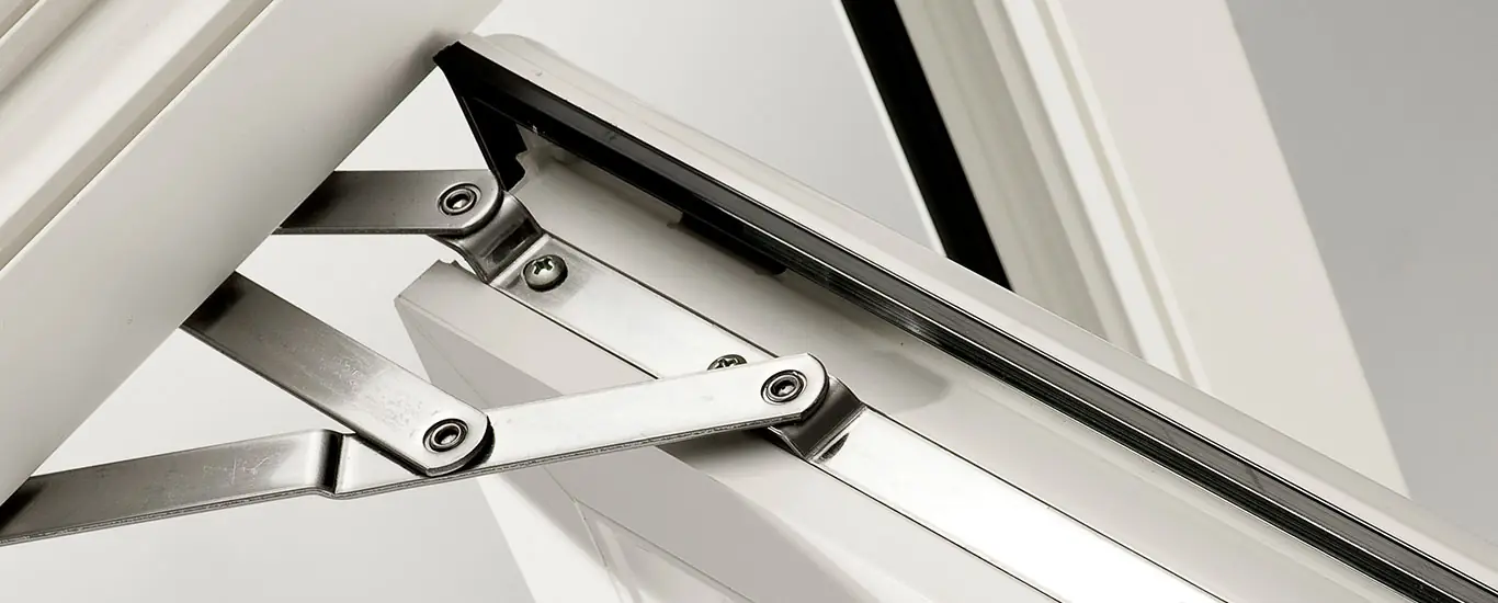 Close-up of a casement window friction stay hinge